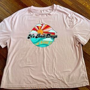 An extra large oversized tee with a cute slogan on the front!